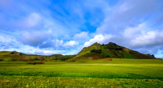Mountains And Green Fields
