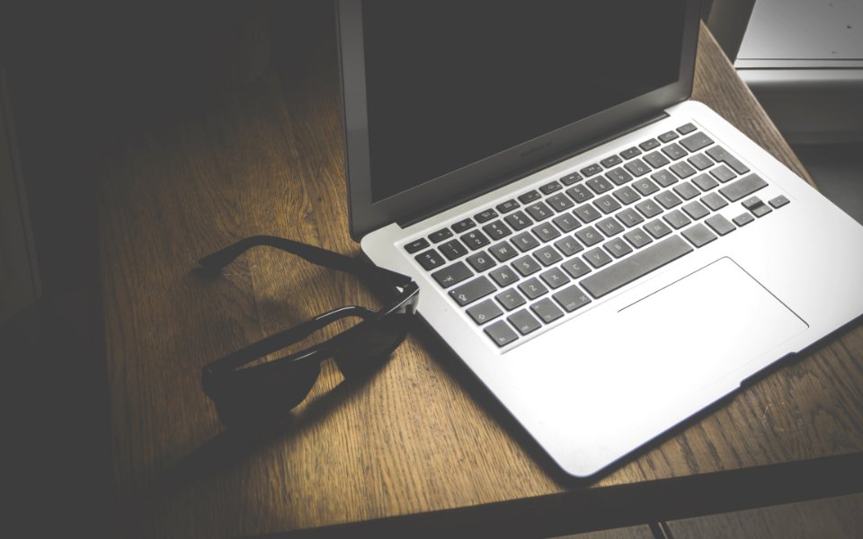 Laptop And Sunglasses