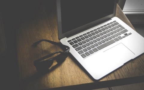 Laptop And Sunglasses