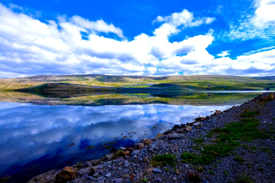 Clouds Reflecting In Blue Lake