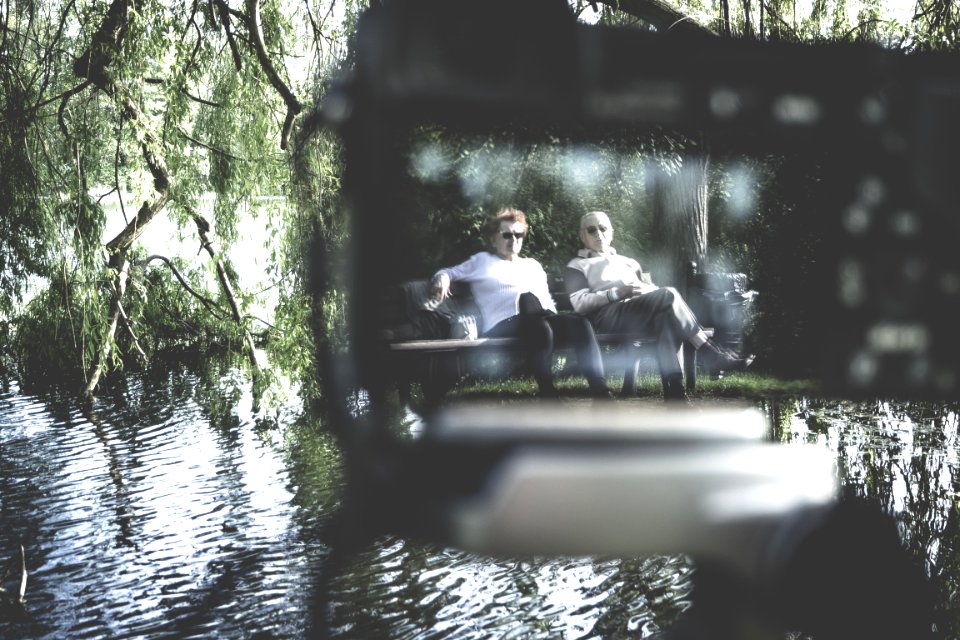 Men Siting On Park Bench