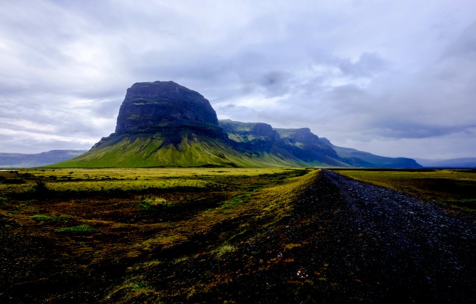 Rock Formation In Green Field photo