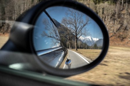 Mountains Reflecting In Rear View Mirror