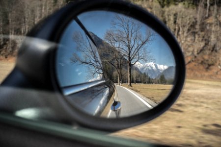 Mountains Reflecting In Rear View Mirror photo