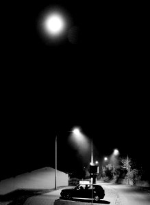 Full Moon Above 5 Door Hatchback Near Electrical Post