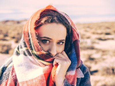 Woman With Scarf Over Face