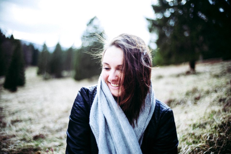 Portrait Of Woman In Sunny Forest