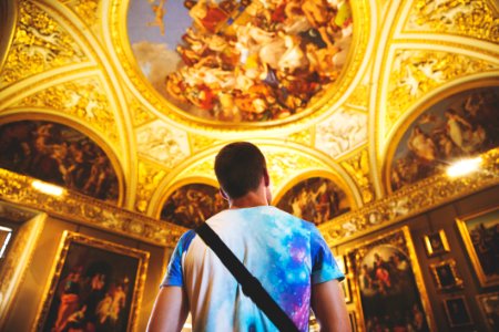 Man Standing In Cathedral