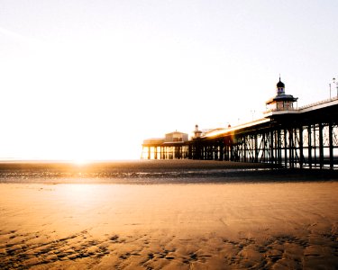 Beach And Pier At Sunset photo