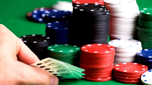 Poker Game With Chips On Table