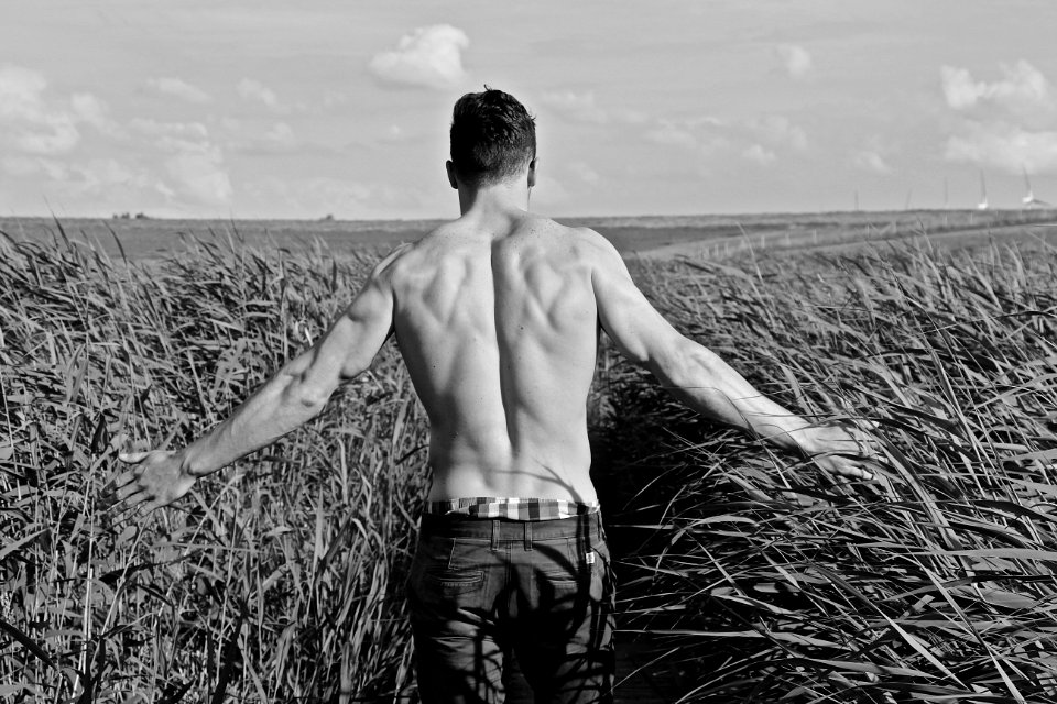 Farmer Dressed In Shorts Checking His Crop
