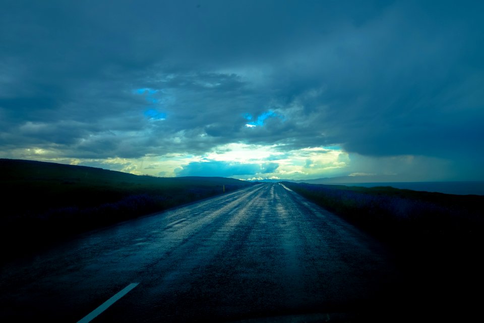 Blue Storm Clouds Over Empty Road