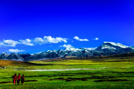 Scenic View Of Mountains Against Blue Sky photo