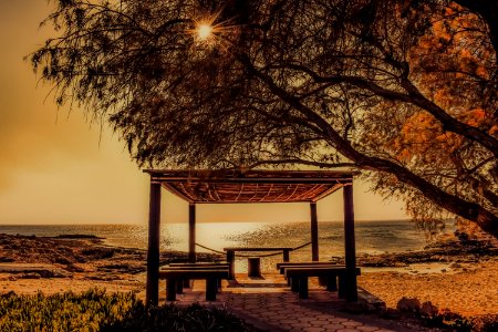 Scenic View Of Sea Against Sky During Sunset photo