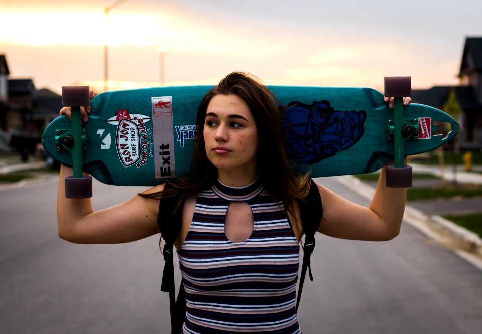 Woman With Longboard