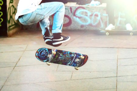 Skateboarder Doing Tricks photo