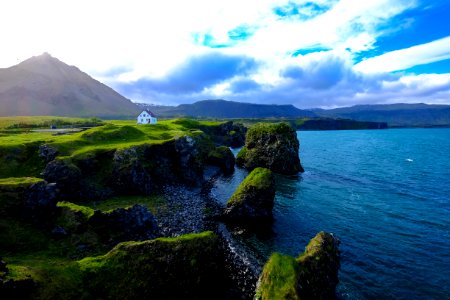 House On Cliff Over Waterfront photo