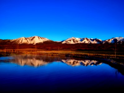 Mountains Reflecting In Lake photo