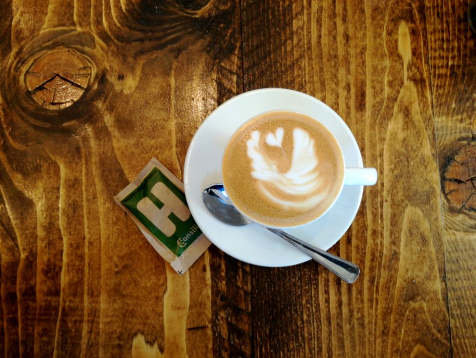 Cup Of Coffee On Wooden Table