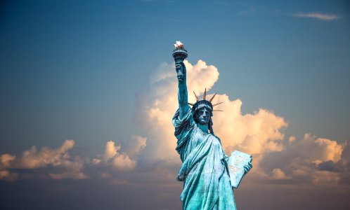 Statue Of Liberty Against Clouds photo