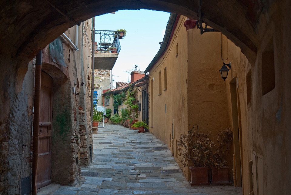 Sidewalk buildings arch