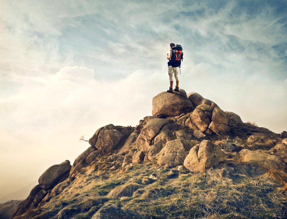 Climber On A Mountain Peak