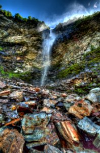 Waterfall On Rocky Cliff photo