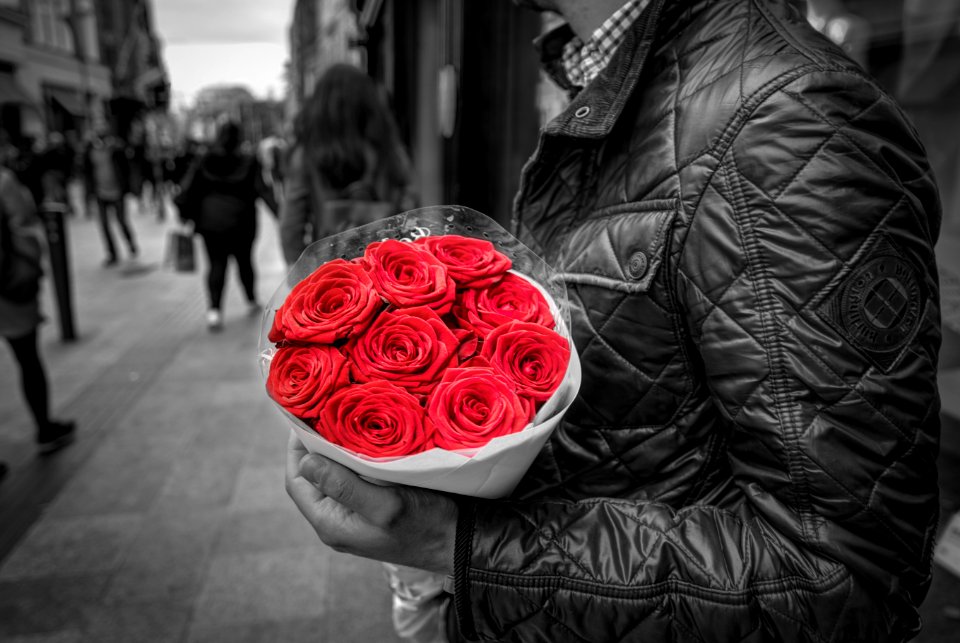 Man Holding Red Rose Bouquet