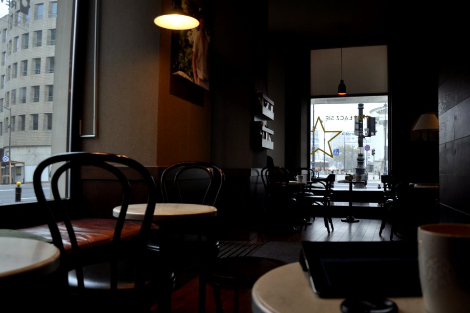 Empty Restaurant Tables And Chairs