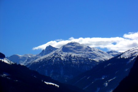 Mountain Peaks Covered In Snow