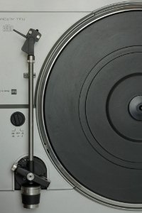 Grey And Black Turntable In A Close Up Photography photo