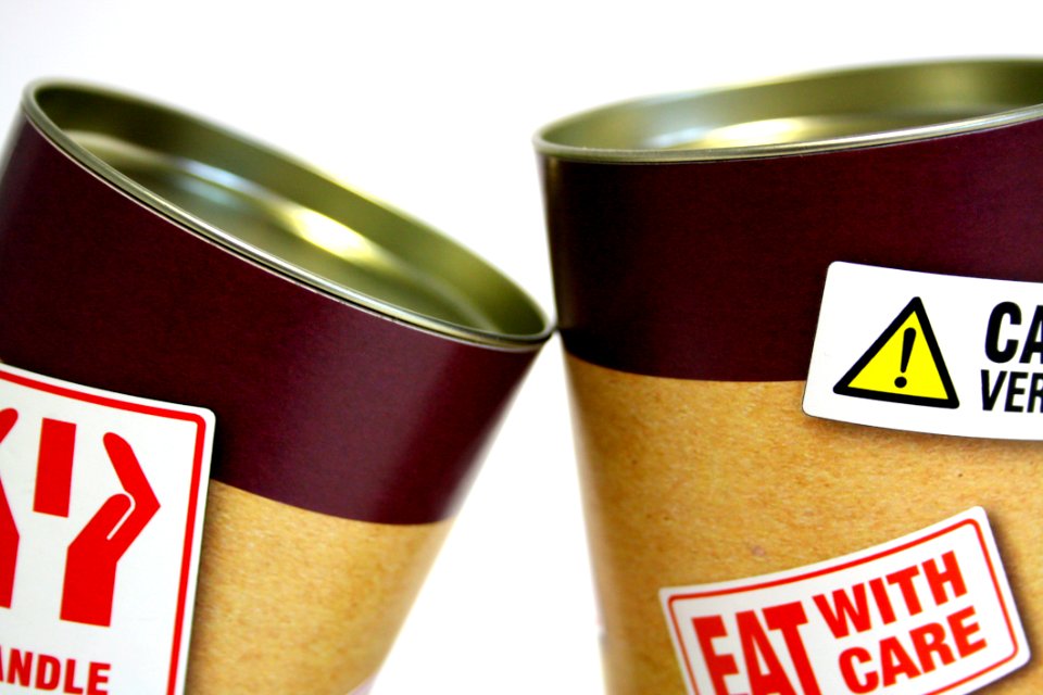 Two Cans With Fat Warning Stickers