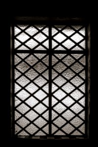 Metal Bars Over Glass Window photo