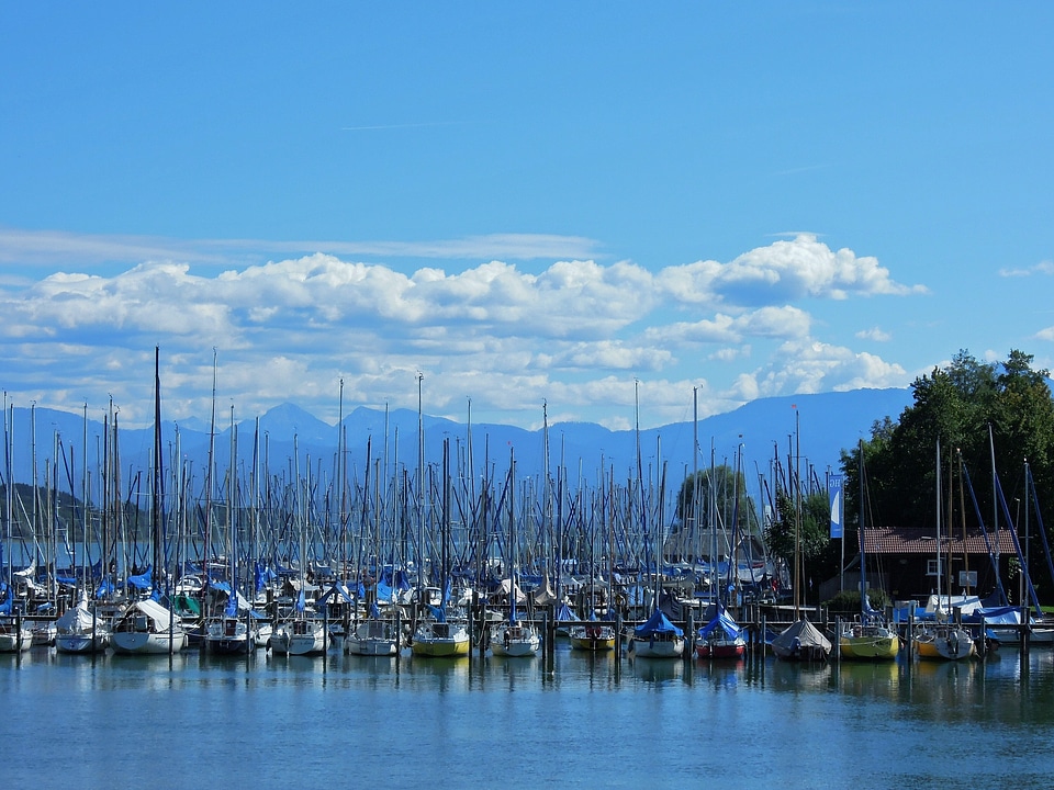 Clouds sailing vessel masts photo