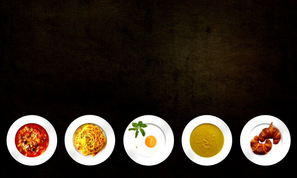 Five White Plates With Different Kinds Of Dishes