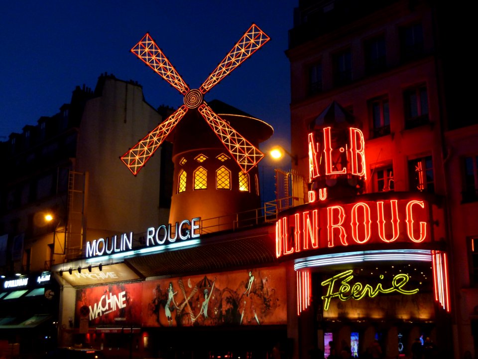 Moulin Rouge Neon Light Sign On Concrete Building