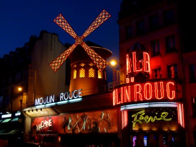 Moulin Rouge Neon Light Sign On Concrete Building