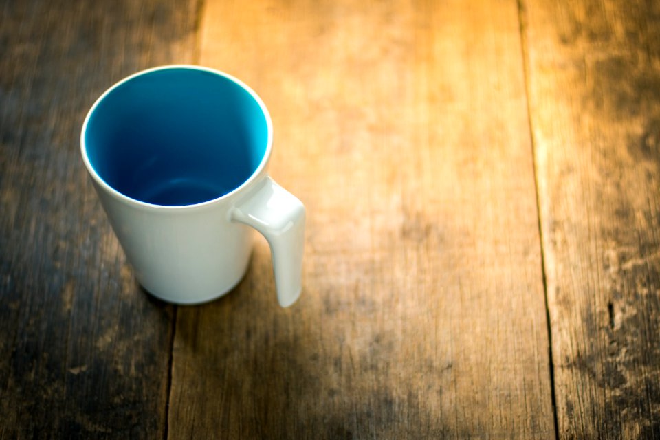 Cup On Wood Table
