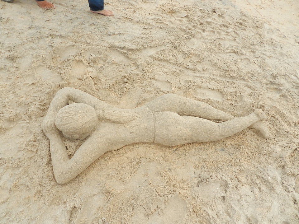 Woman sand art figure