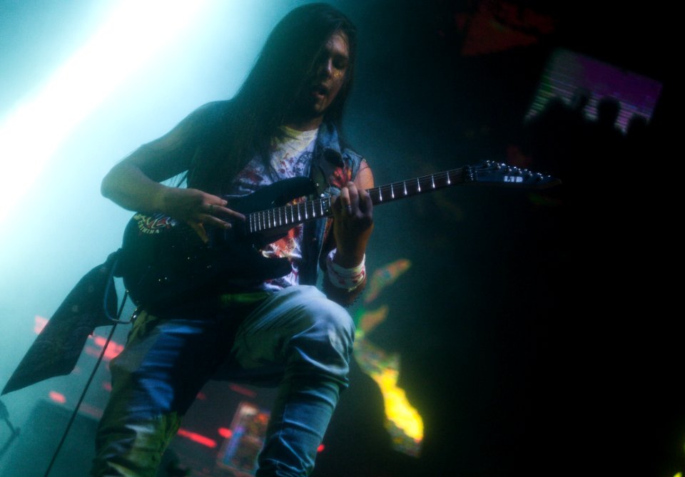 Musician Playing Guitar Onstage