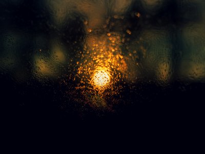 Raindrops On Dark Window