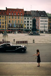 WOMAN AND THE OLD CAR