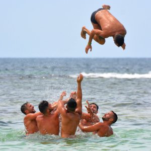 Man Beach Sea Body Of Water photo