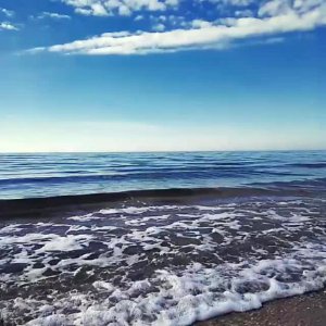 Waves Breaking On A Beach