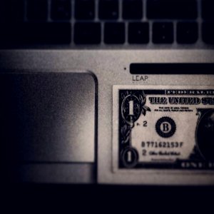 Dollar Bill On Laptop