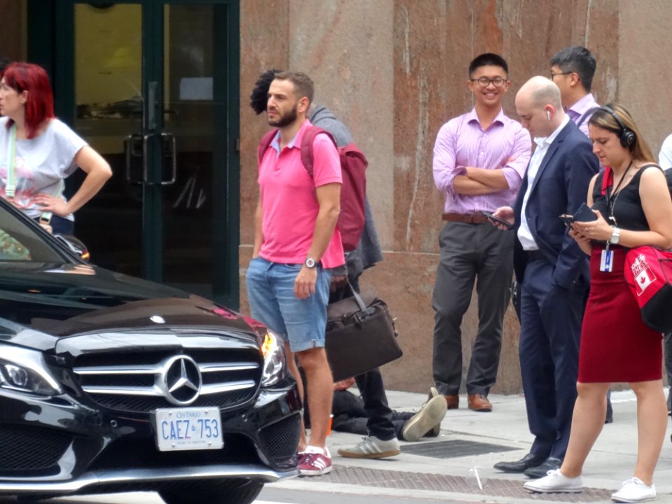 Passersby Ignore A Panhandler At Yonge And Richmond 2017 08 22 -b photo