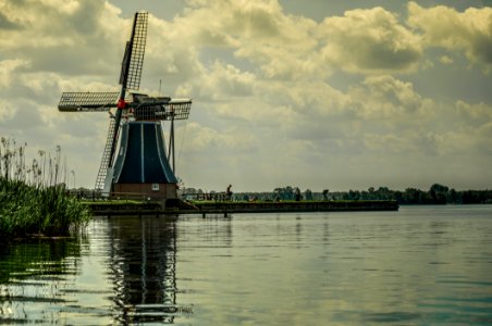 Typical Dutch Windmill At A Lake photo