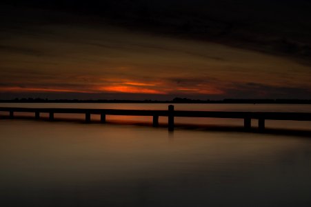 Long Exposure Lake With Pier photo