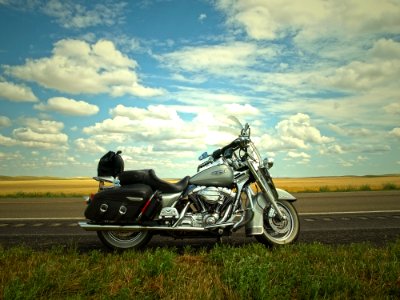 Gray And Silver Cruiser Motorcycle Near Green Grass Lawn photo