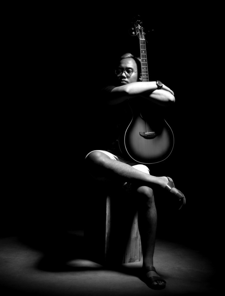 Man Holding Guitar